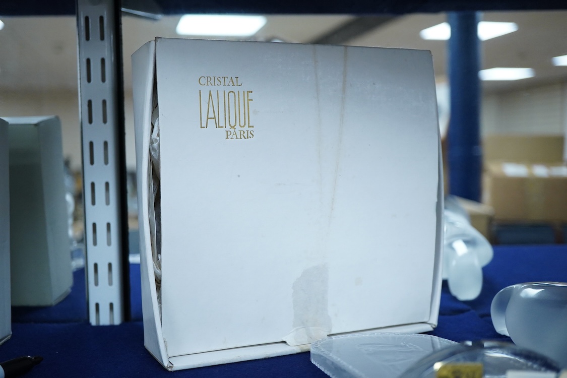 A Lalique ‘Vierge A L’Enfant Agenouille statue’ 20cm high, together with a model of ‘Virgin with hands together’, 25cm high (both boxed)